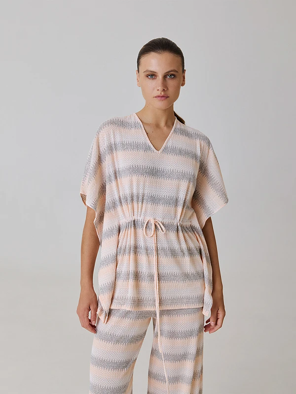 Трикотажная блуза с завязками